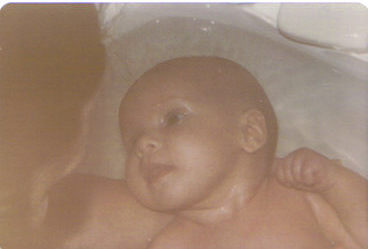 Bath time for Jen with Mom at 2 months